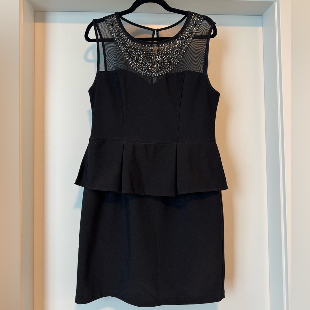 Bisou Bisou Black Sleeveless Peplum Dress with Embellished Neckline